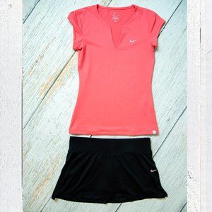 Pink nike tennis top.  Black nike tennis skirt.  S